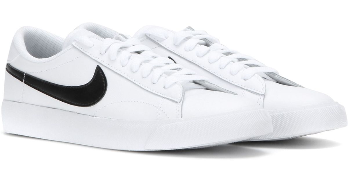 nike leather sneakers white