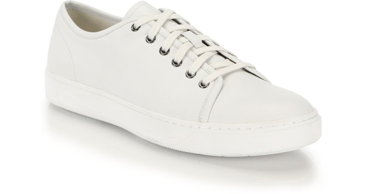 white leather lace up sneakers