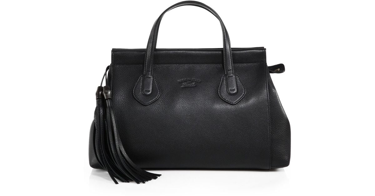 gucci black bag with tassel