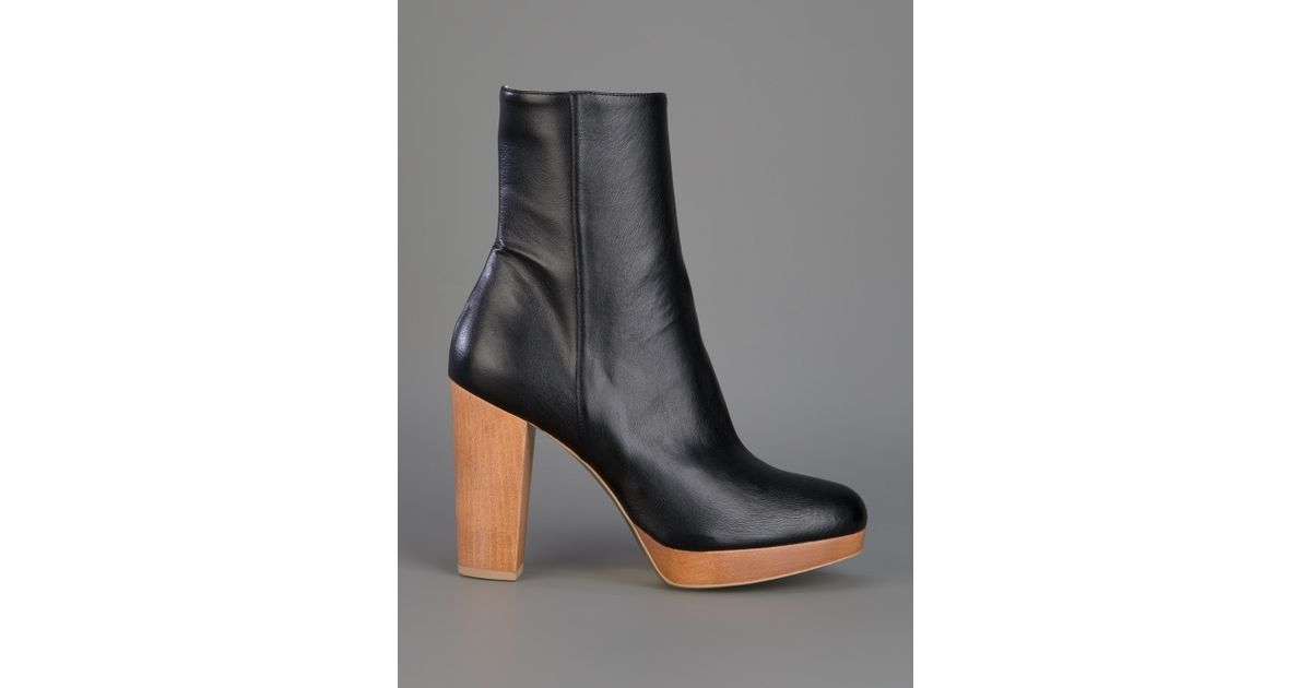 black leather booties with wooden heel