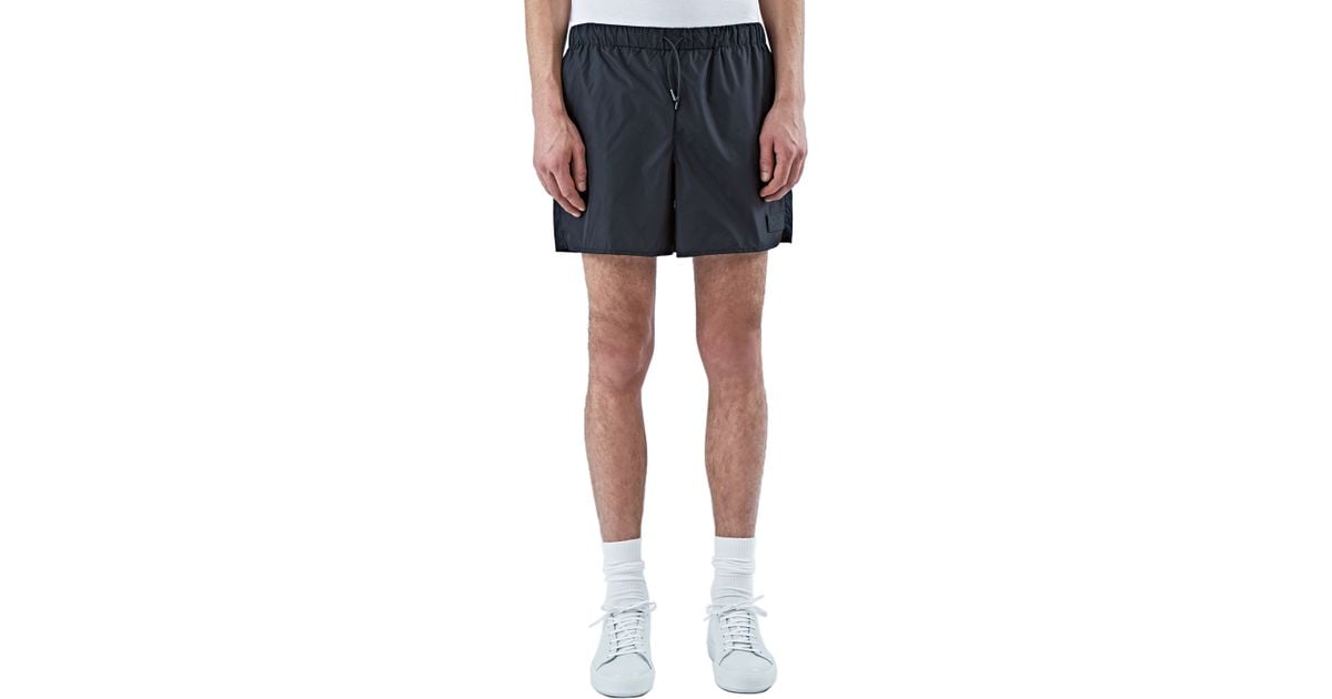 acne studios swim shorts