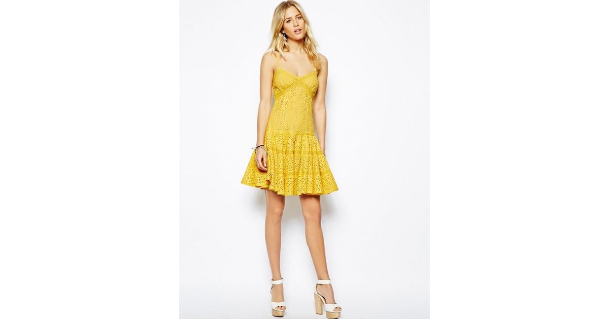 needle and thread yellow dress