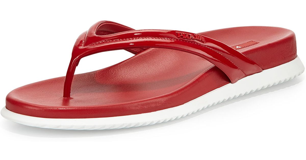 red patent leather flip flops