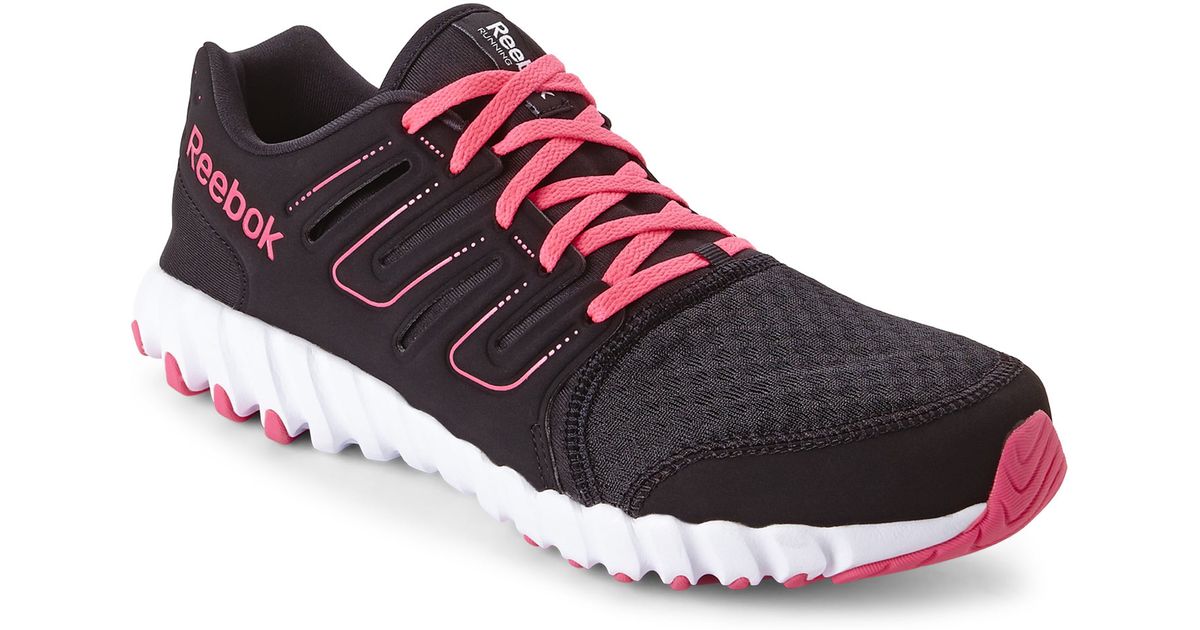 black and pink running shoes