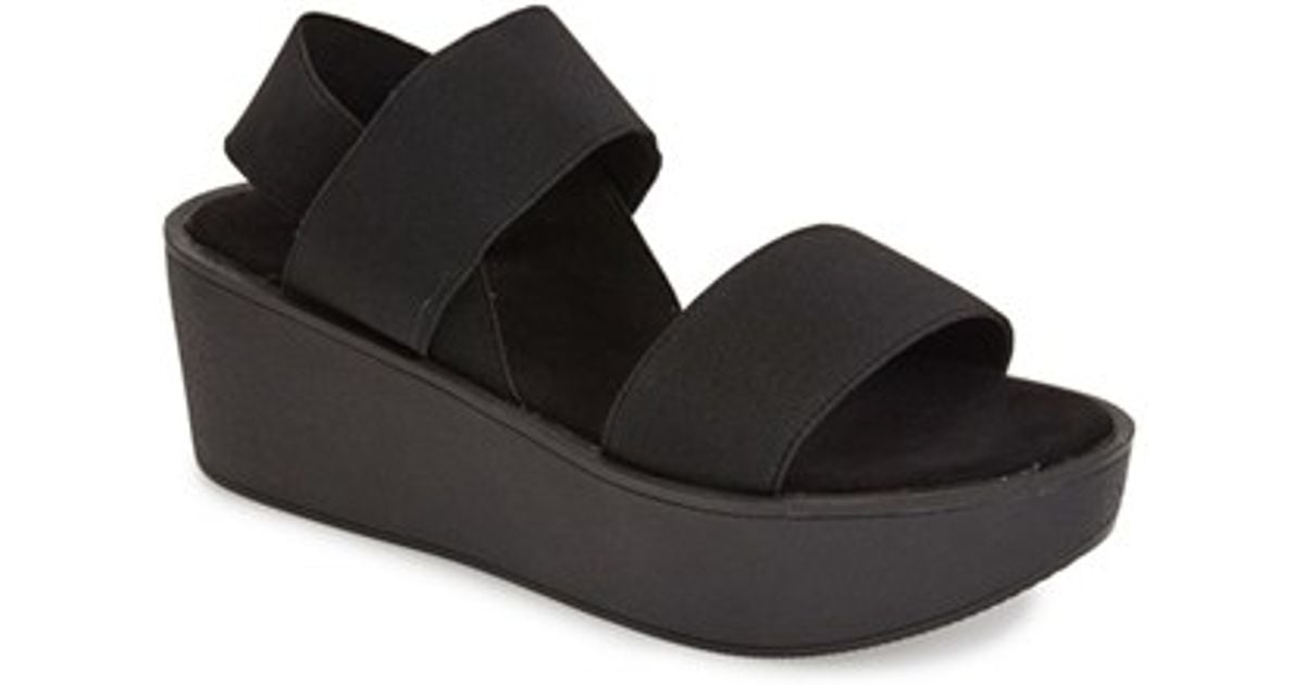 black elastic sandals flat