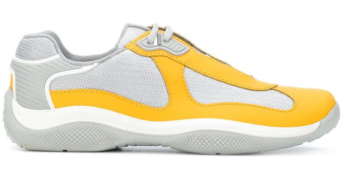 prada yellow and black sneakers