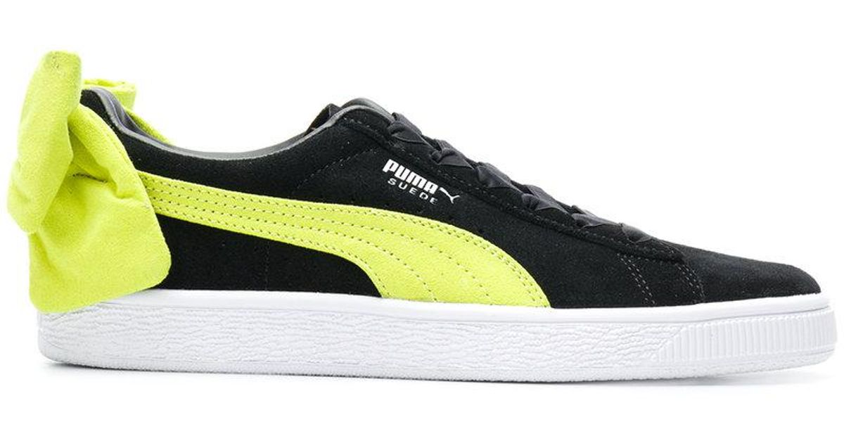 puma with bow on back