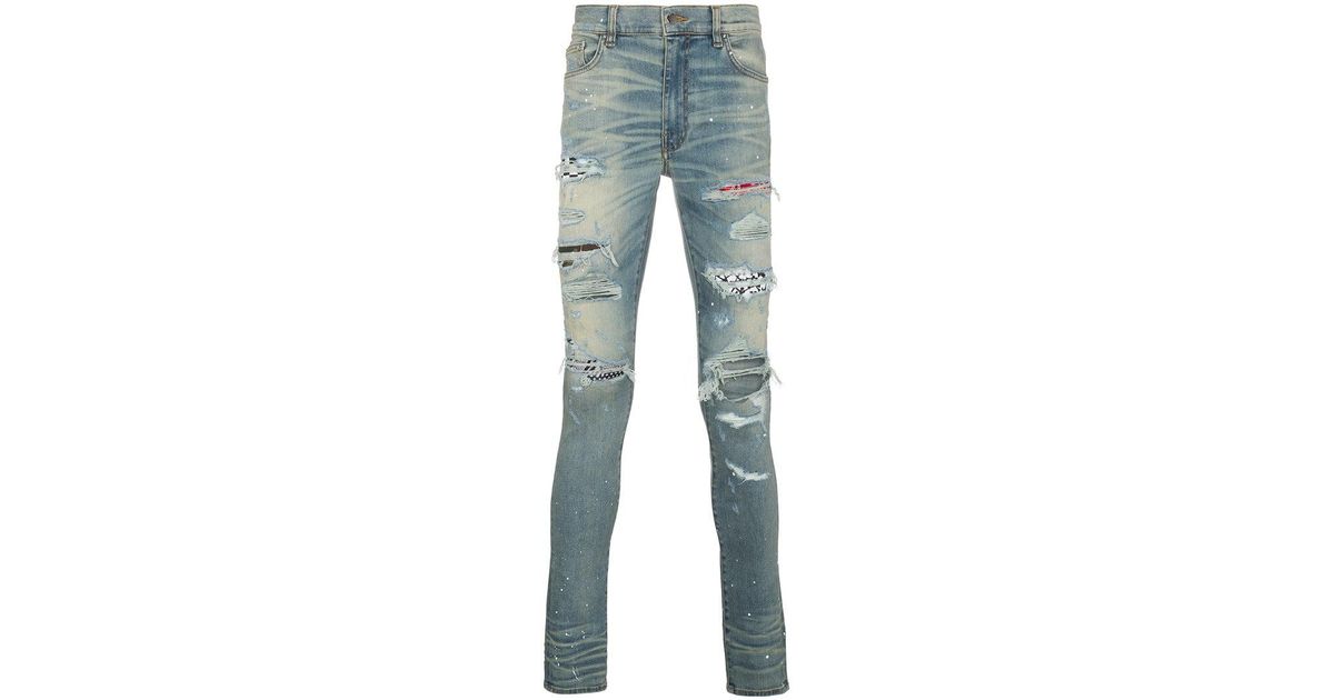 Amiri Denim Art Patch Printed Jeans in 
