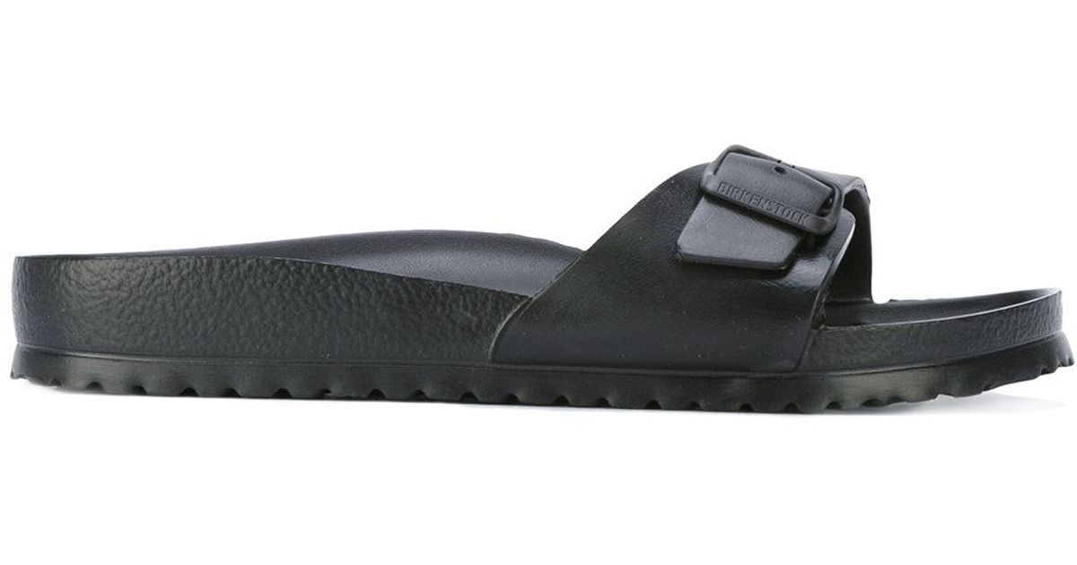 Birkenstock Rubber Buckled Sandals in Black Lyst Birkenstock Rubber Buckled Sandals in Black Lyst