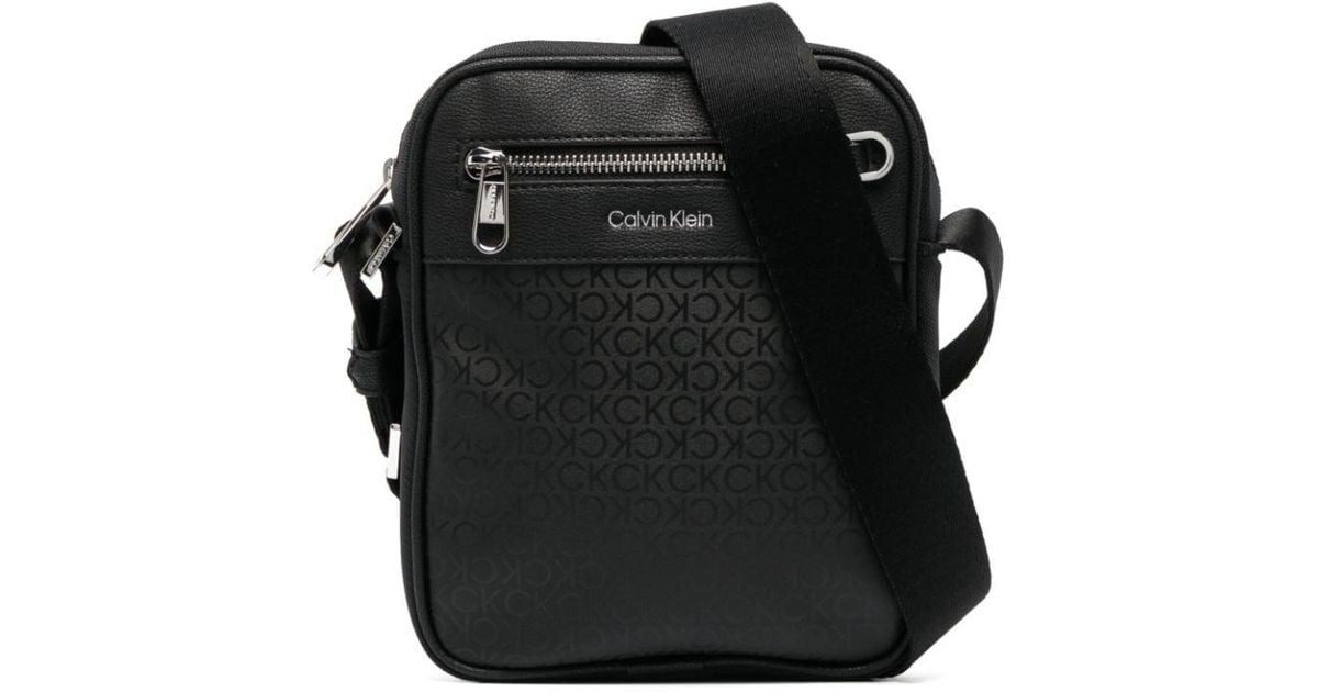 Calvin Klein Monogram-print Zipped Messenger Bag in Black for Men
