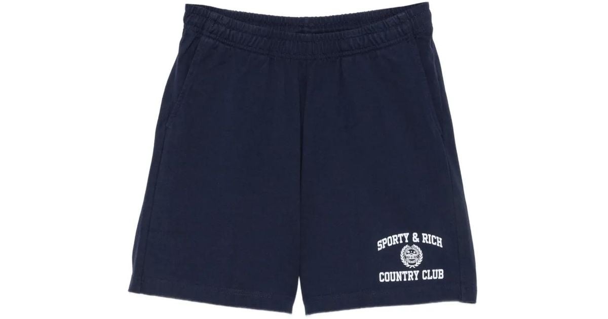 【新品】sporty & rich ×  ネイビー ショートパンツ Sporty & Rich ショートパンツ ブルー | Lyst