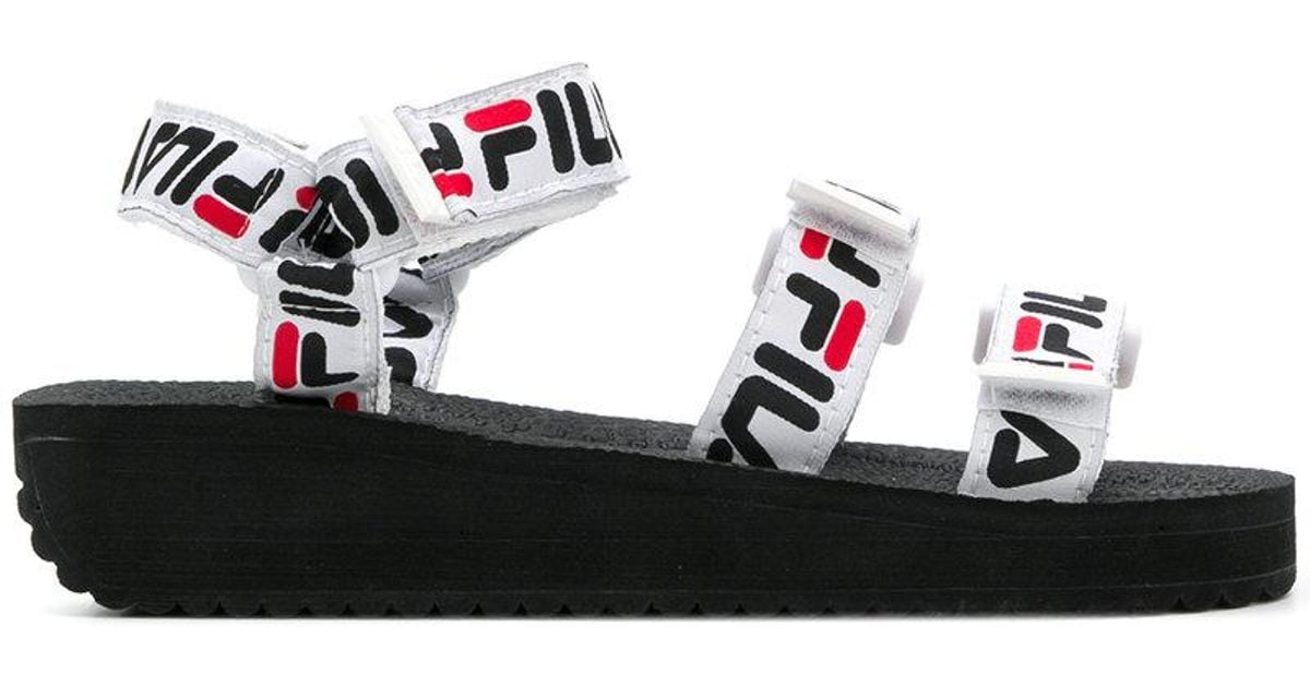  Fila  Rubber Logo Strap Sandals  in Black Lyst