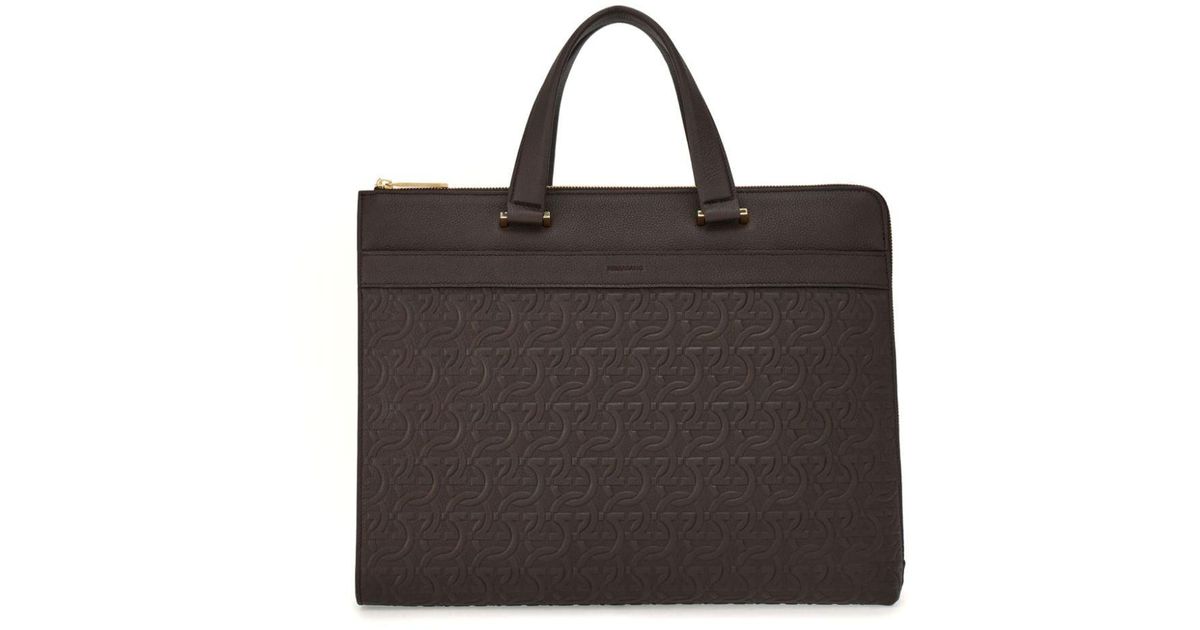 Ferragamo Gancini Print Leather Laptop Bag in Black for Men Lyst Canada