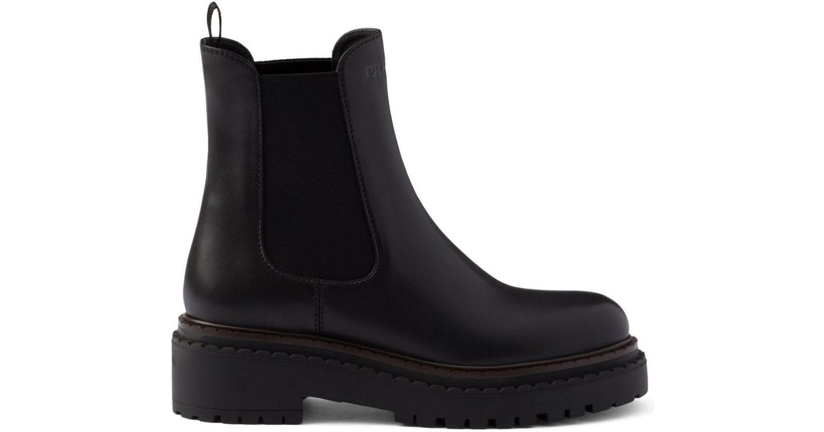 Prada Klassische Chelsea Boots in Schwarz Lyst AT