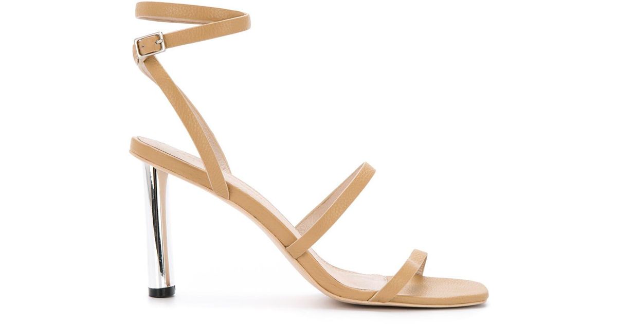 manning cartell gold shoes