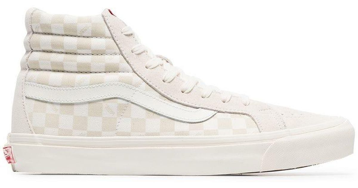 beige high top vans
