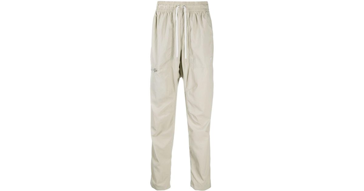 Nike Modern Essential Woven Track Pants for Men | Lyst
