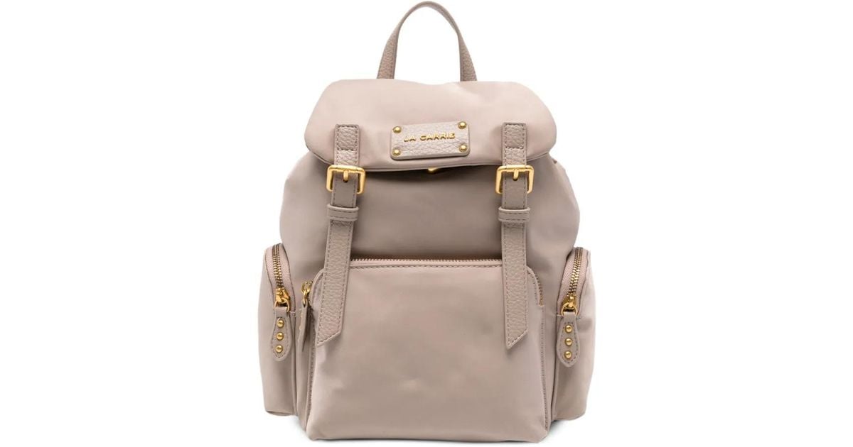 la-carrie-buckle-flap-backpack-in-natural-lyst