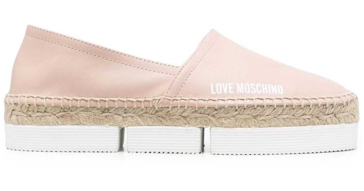 Femme Chaussures Chaussures plates Espadrilles et sandales Espadrilles à logo imprimé Love Moschino en coloris Blanc 