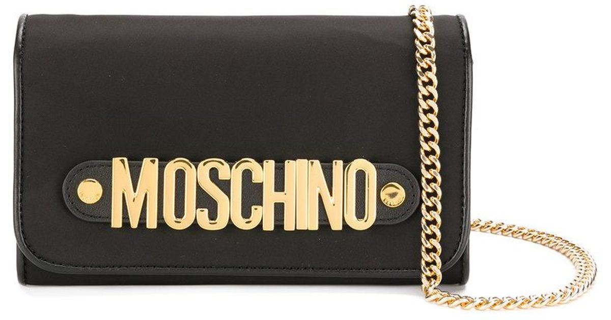 Moschino Logo Clutch Bag in Black - Lyst