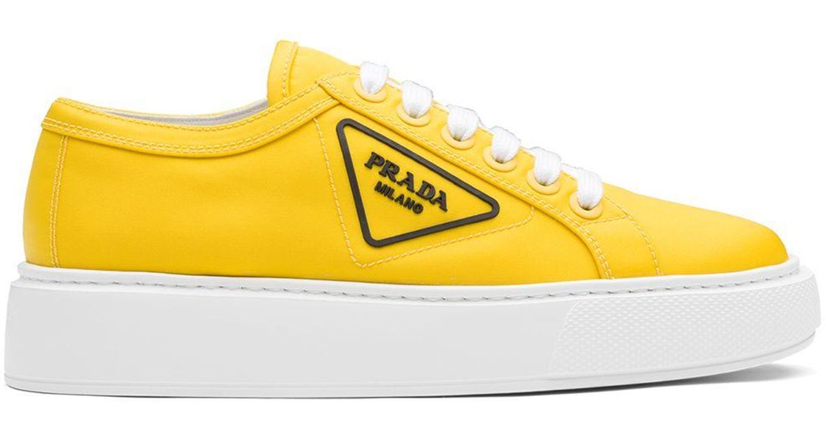 prada yellow and black sneakers