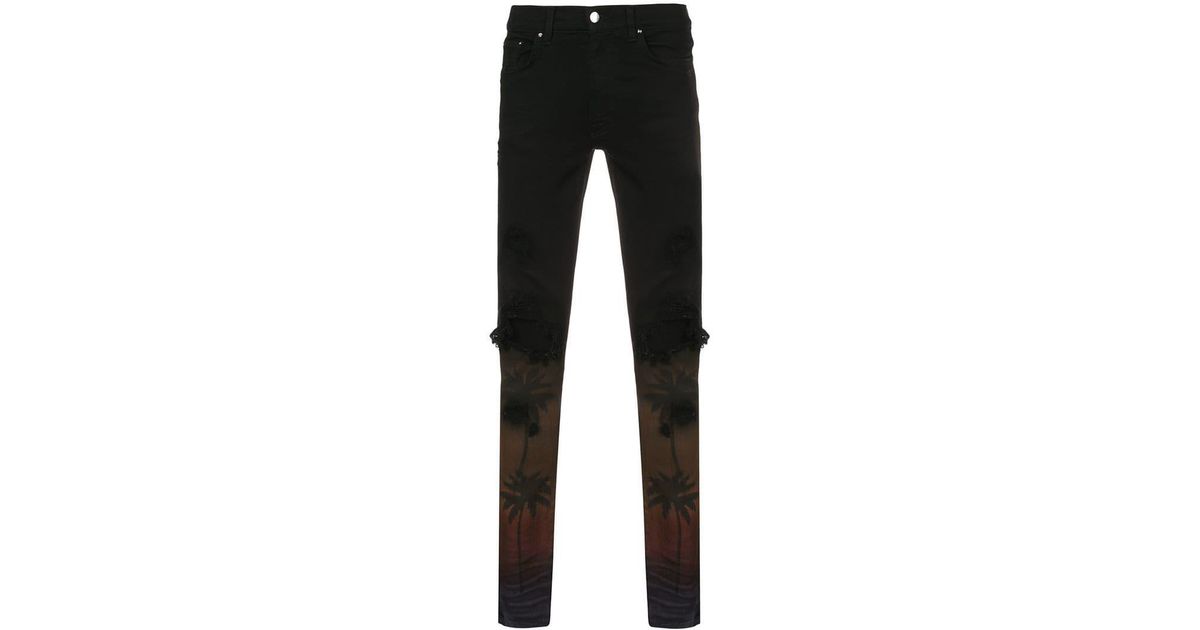Amiri Denim Palm Trees Skinny Jeans in 