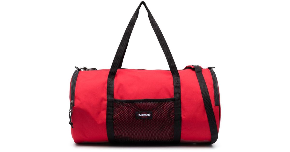 Eastpak X Telfar Cylinder Duffle Bag in Red | Lyst