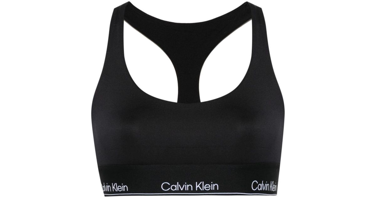 Calvin Klein logo-print Racerback Sports Bra - Farfetch