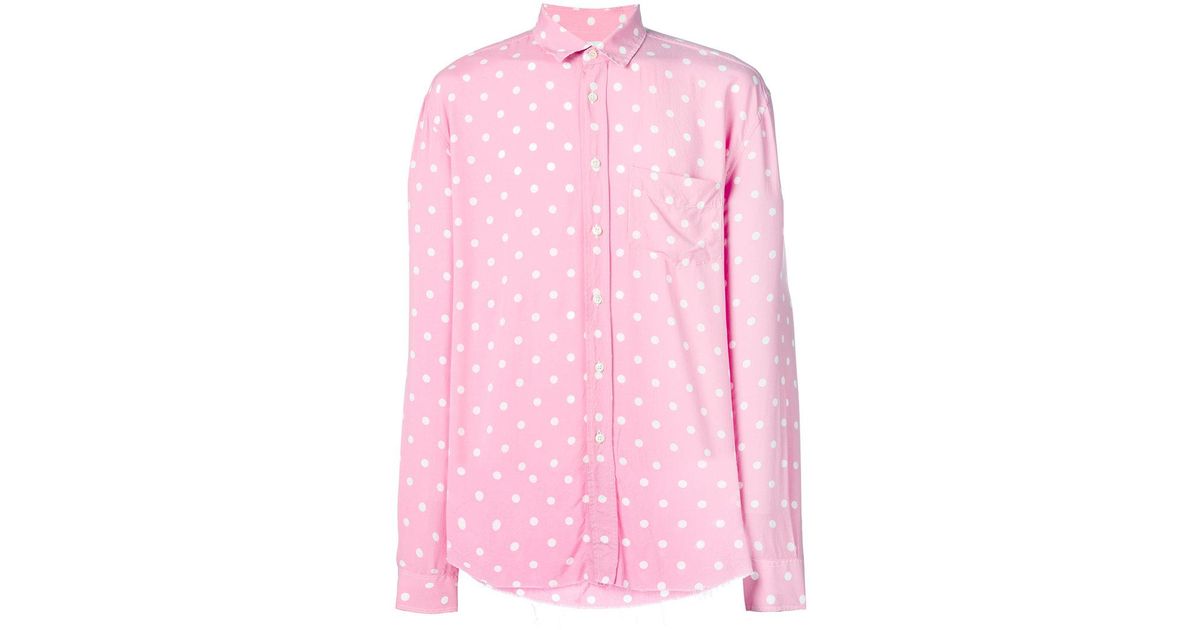 white shirt with pink polka dots