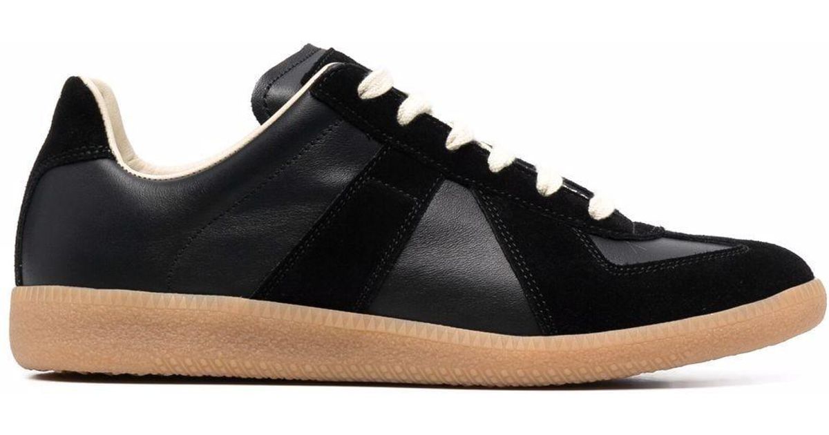 stan smith noir et doré