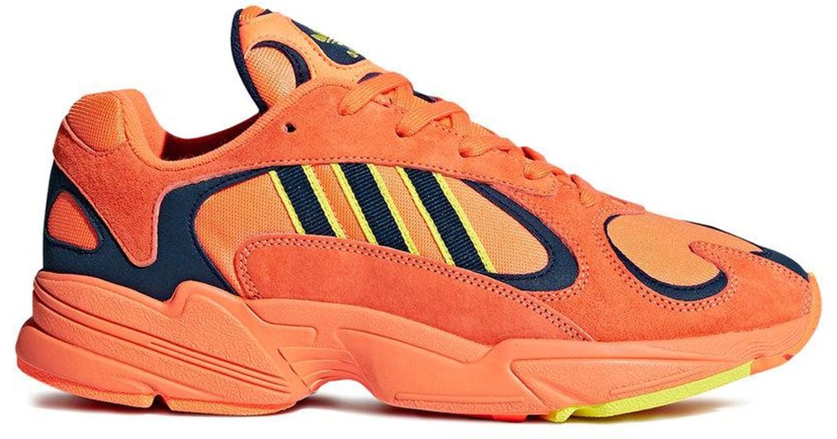 neon orange adidas shoes