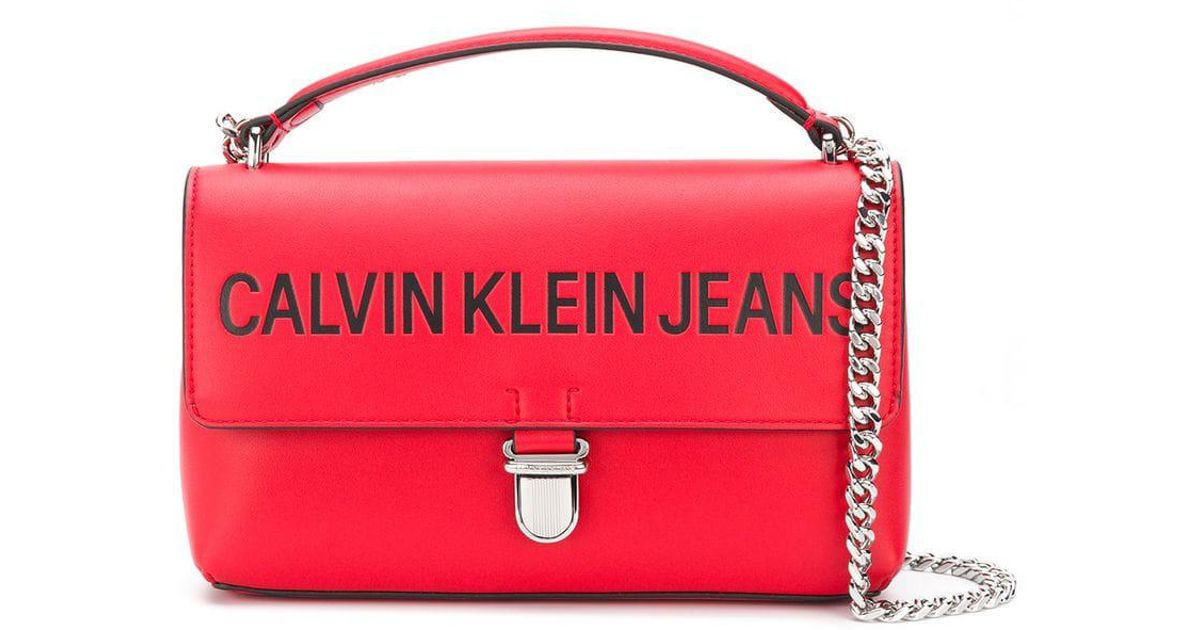 Calvin Klein Denim Sculpted Flap Shoulder Bag in Red - Lyst