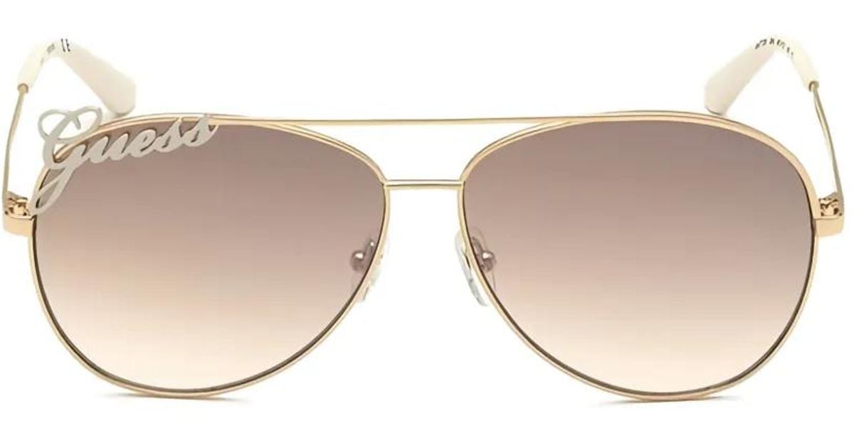 Guess Logo-Lettering Navigator-Frame Sunglasses in Natural | Lyst UK