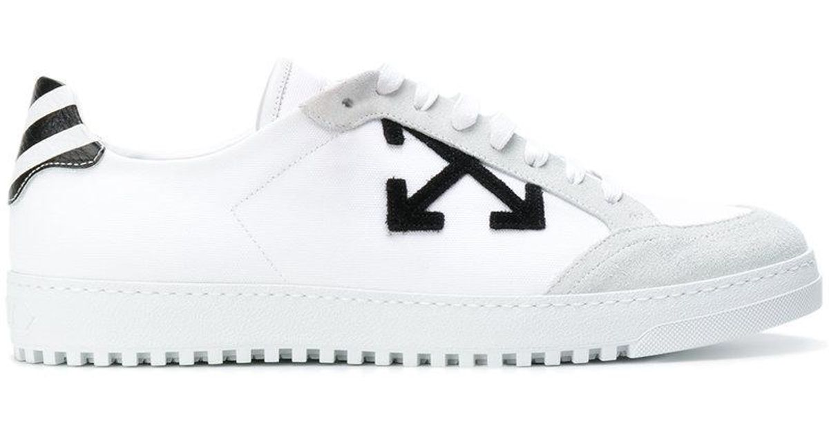 sneakers with arrows