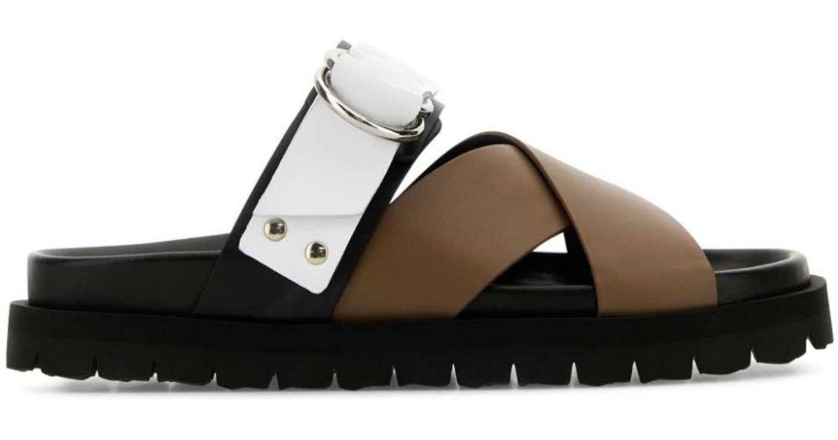 Pierre Hardy Cross Rider Slides in Black | Lyst