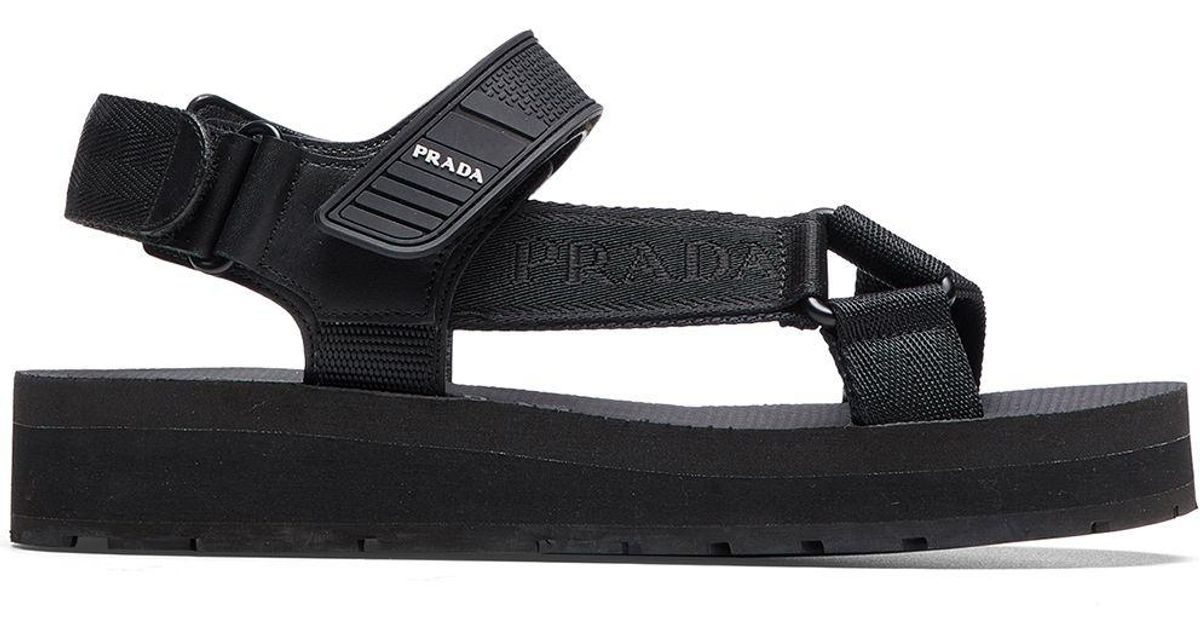 Sandali Nomad con decorazione di Prada in Nero | Lyst