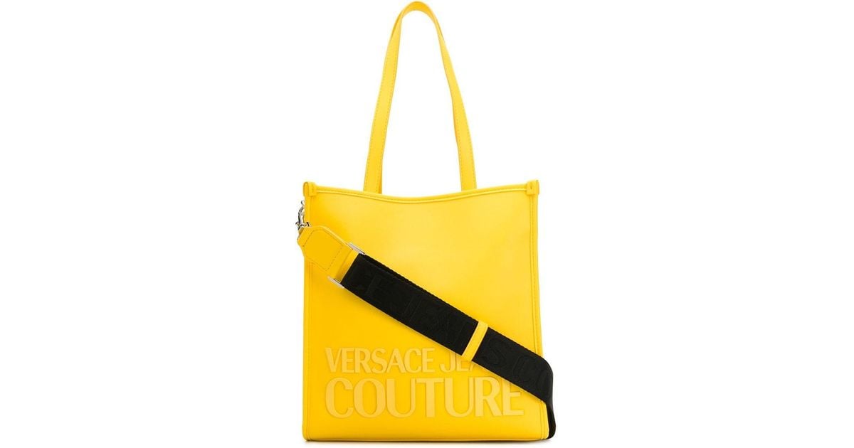 yellow logo rubber tote