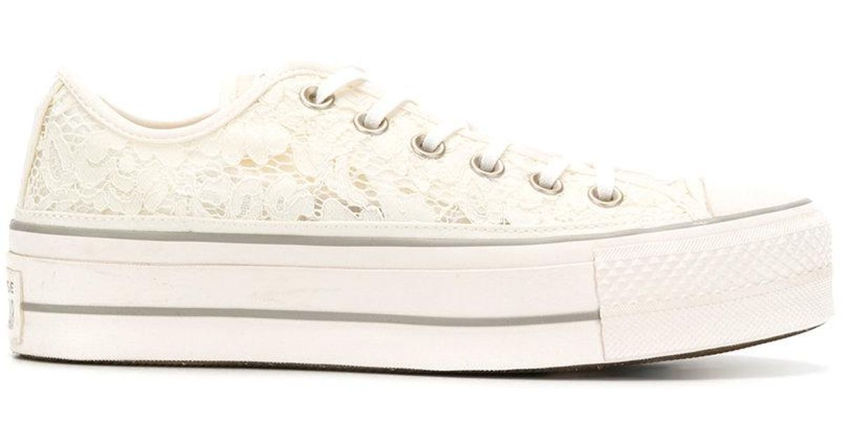 white embroidered converse