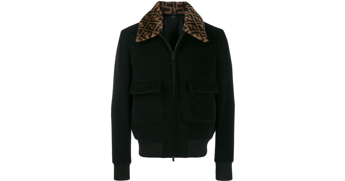 Fendi black bomber jacket with collar logo worn by Cane Tejada