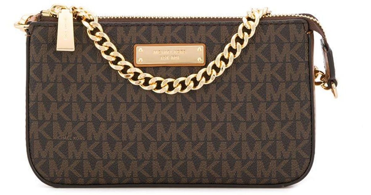 Michael Kors Michael Michael Kors Logo Clutch Bag - Neutrals Clutches,  Handbags - MIC244945