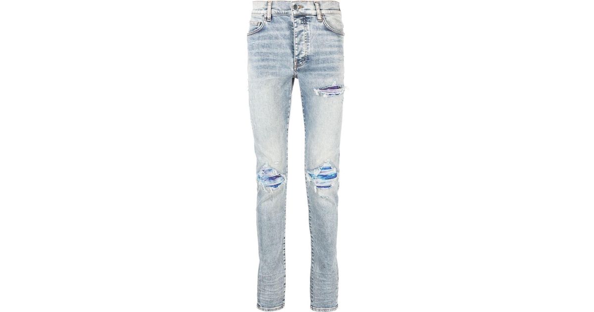 Amiri Light-wash Ripped Skinny Jeans in Blue for Men | Lyst