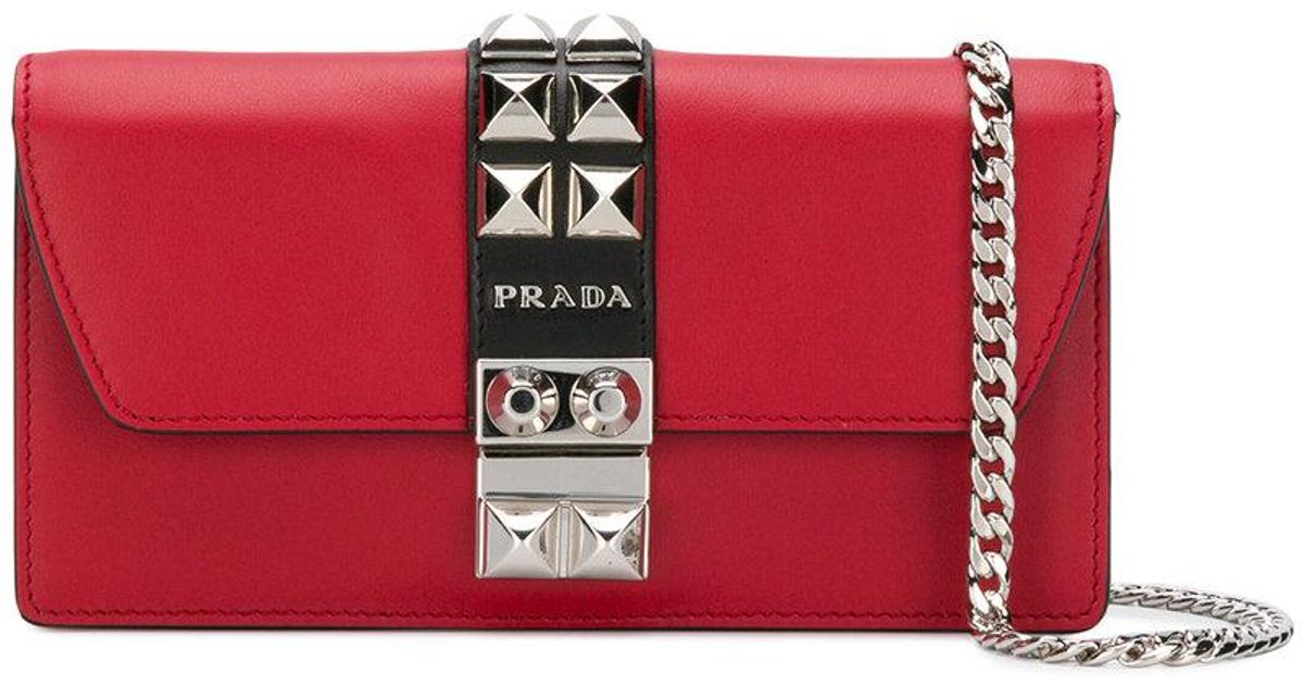 red studded clutch