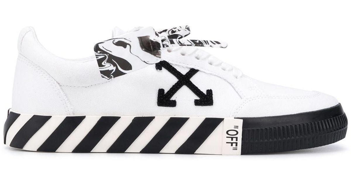 off white logo patch low top sneakers