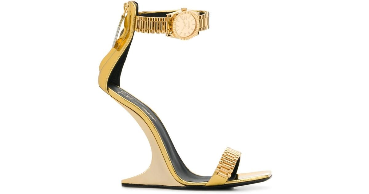 Giuseppe Zanotti X Cowan Watch Sandals in Gold (Metallic) | Lyst