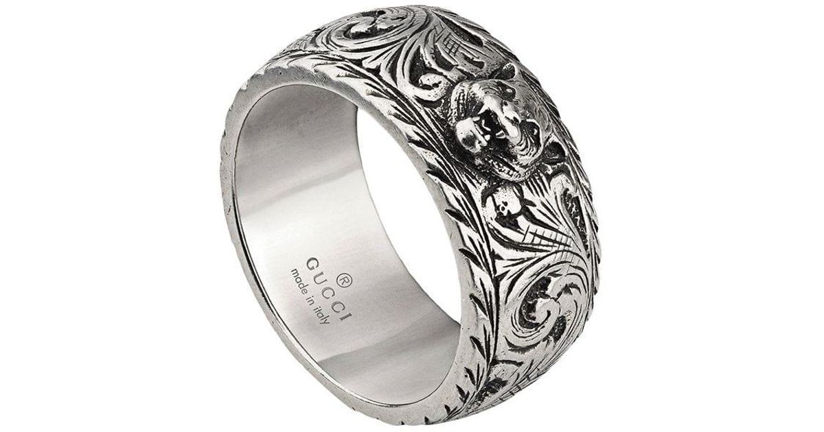 Thin silver ring with feline head deals