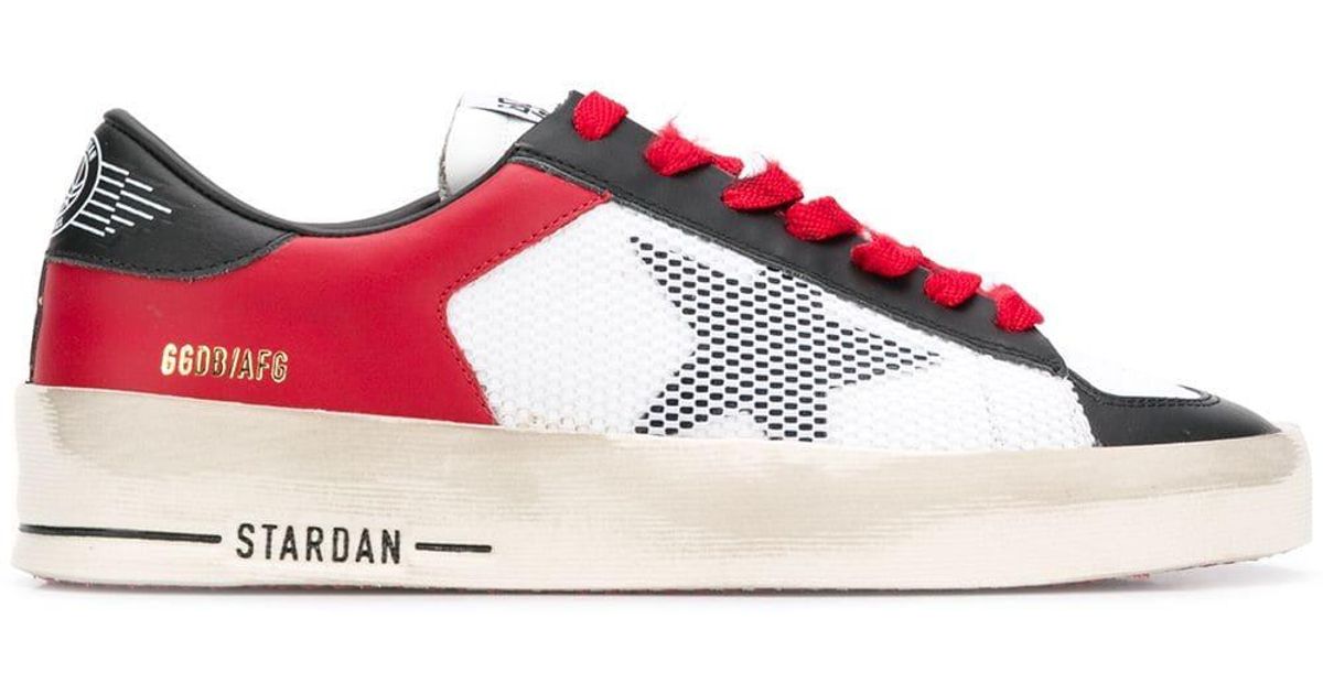 golden goose with red star