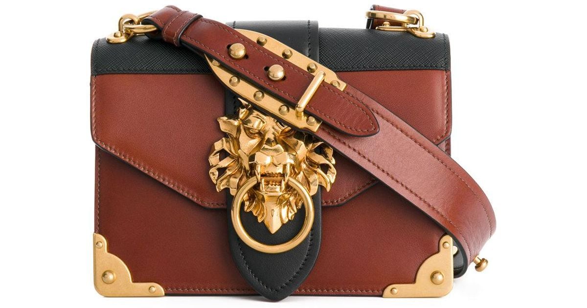 Prada Leather Cahier Lion-embellished 