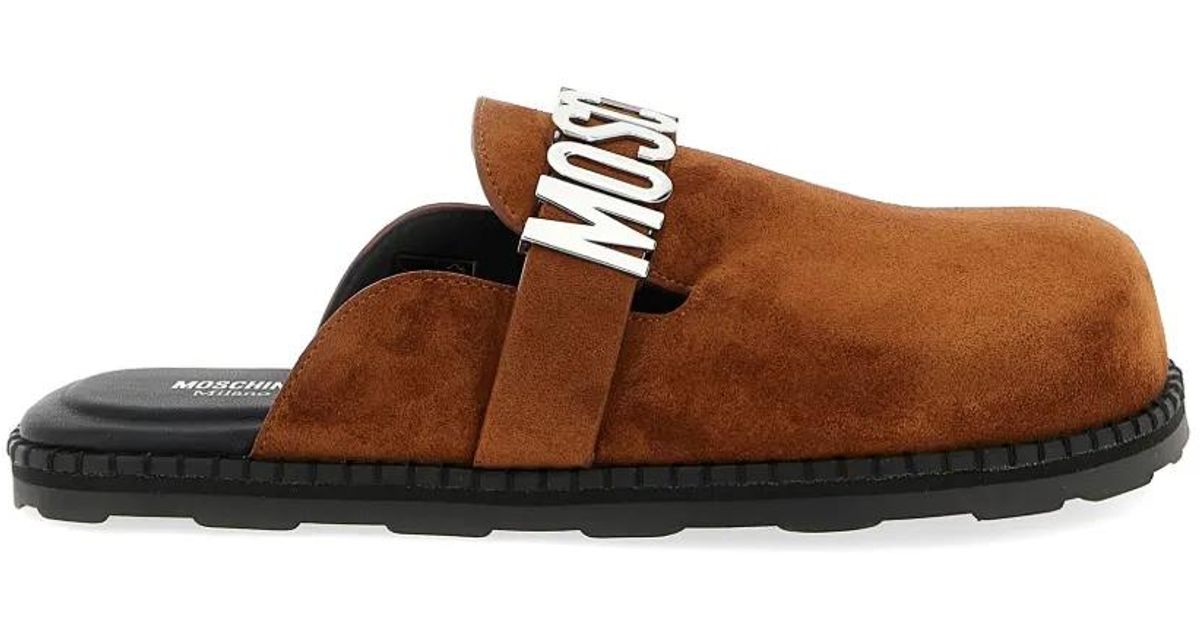 Mules Lettering Moschino Lettering Logo-Strap Mules in Brown | Lyst
