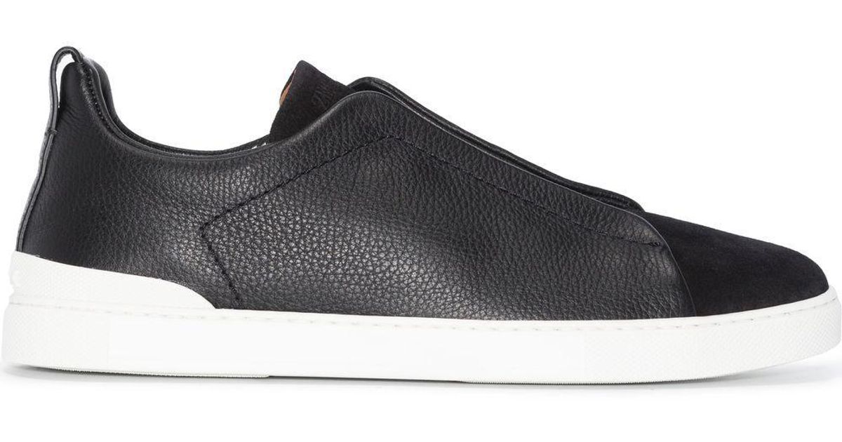 elasticated slip on trainers