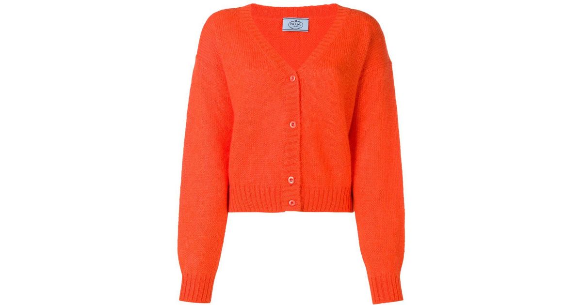 orange cropped cardigan